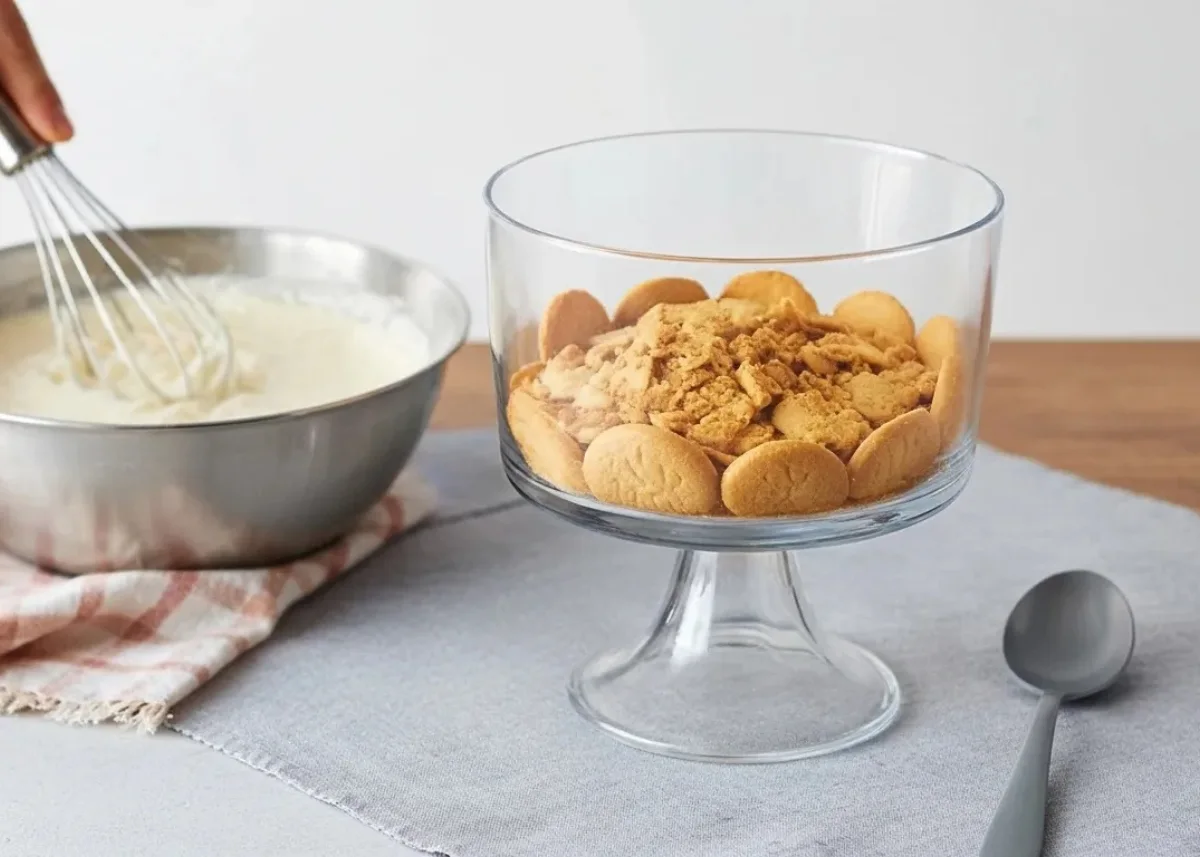 ingredients for pumpkin cheesecake trifle cups: cream cheese, pumpkin purée, pumpkin pie spice, vanilla, sugar, whipped topping, gingersnaps, graham, Biscoff, caramel, pecans