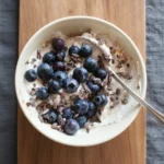 Blueberry Yogurt Bowl (Healthy & High Protein) 2 reamy blueberry yogurt bowl close-up