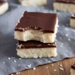 Bite taken from coconut chocolate bar