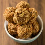 close-up view of a chewy banana oat cookie showing soft interior texture