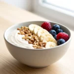 Close up of creamy banana oat smoothie bowl