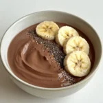 close up of creamy cocoa yogurt bowl