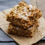 Soft cinnamon oat square close up texture